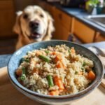 A close-up of a bowl filled with a Lamb and Rice Easy Digest Bowl for Simple Feeding, with a golden retriever in the background.
