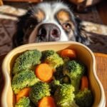 A dog curiously peeking over a bowl of steamed broccoli and carrots, part of a Turkey and Broccoli Cleansing Meal.